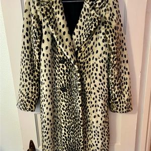 Brand new. Never worn House of Harlow faux fur coat